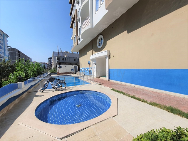 شقة اقتصادية ضمن منطقة حيوية في مهموتلار / الانيا 