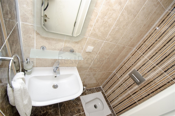 شقة 2 + 1 في 150 متر من شاطئ كونيالتي في انطاليا 