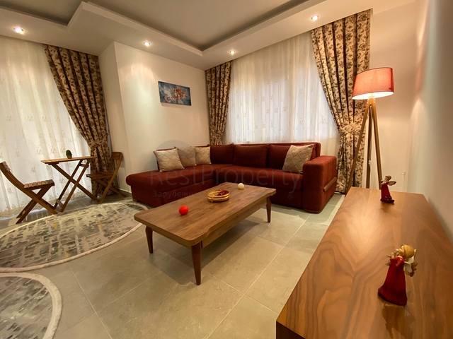 شقة تصميم غرفة وصالة ضمن مجمع سكني حديث في مهموتلار 