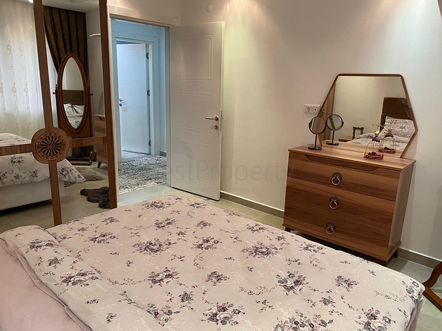 شقة تصميم غرفة وصالة ضمن مجمع سكني حديث في مهموتلار 