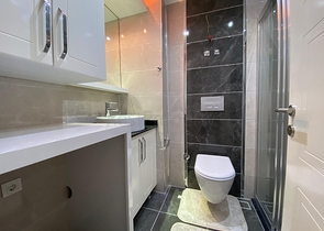 شقة تصميم غرفة وصالة ضمن مجمع سكني حديث في مهموتلار 