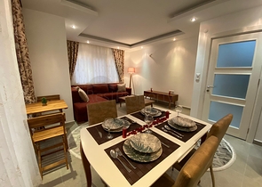 شقة تصميم غرفة وصالة ضمن مجمع سكني حديث في مهموتلار 