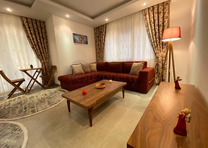 شقة تصميم غرفة وصالة ضمن مجمع سكني حديث في مهموتلار 