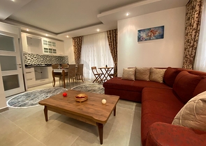 شقة تصميم غرفة وصالة ضمن مجمع سكني حديث في مهموتلار 