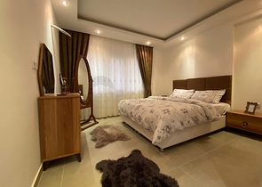 شقة تصميم غرفة وصالة ضمن مجمع سكني حديث في مهموتلار 