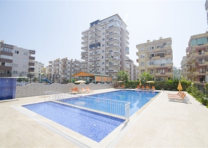 شقة غرفة وصالة ضمن مجمع سكني حديث بسعر جيد 