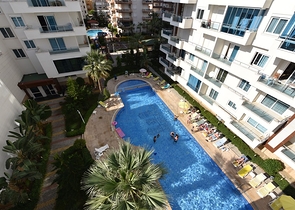 شقة غرفتين وصالة واسعة - ضمن مجمع سكني فاخر قريب من البحر 