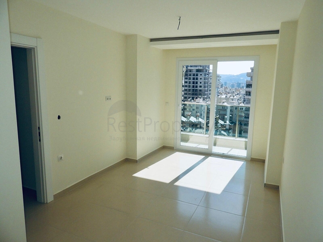 شقة غرفتين وصالة - مطبخ منفصل - ضمن مجمع في مهموتلار / الانيا 