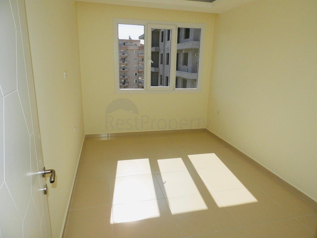 شقة غرفتين وصالة - مطبخ منفصل - ضمن مجمع في مهموتلار / الانيا 