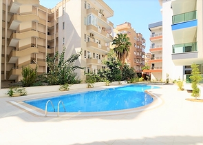 شقة غرفتين وصالة - مطبخ منفصل - ضمن مجمع في مهموتلار / الانيا 