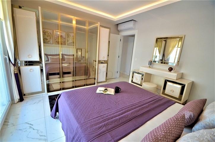 شقة فاخرة من تصميم  غرفة وصالة مؤثثة ضمن مجمع خمس نجوم في مهموتلار / الانيا 