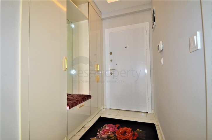 شقة فاخرة من تصميم  غرفة وصالة مؤثثة ضمن مجمع خمس نجوم في مهموتلار / الانيا 