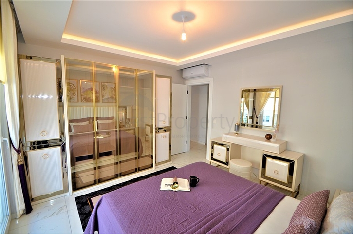 شقة فاخرة من تصميم  غرفة وصالة مؤثثة ضمن مجمع خمس نجوم في مهموتلار / الانيا 