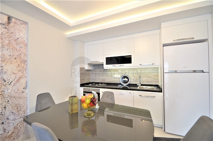 شقة فاخرة من تصميم  غرفة وصالة مؤثثة ضمن مجمع خمس نجوم في مهموتلار / الانيا 