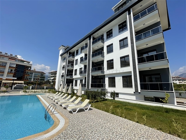 فرصة استثمارية - مجمع سكني قيد الانشاء في منطقة اوبا المركزية / الانيا 