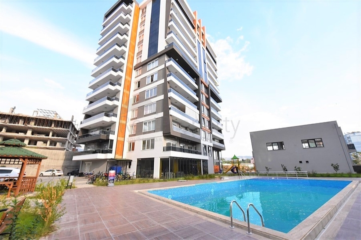 شقة عائلية - ثلاث غرف وصالة ومطبخ منفصل -ضمن مجمع سكني في مهموتلار / الانيا 