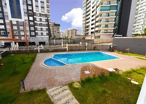 شقة عائلية - ثلاث غرف وصالة ومطبخ منفصل -ضمن مجمع سكني في مهموتلار / الانيا 