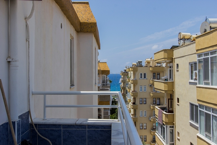 ضمن مجمع سكني اول خط على البحر - 3 غرف وصالة بسعر مميز في مهموتلار / الانيا 