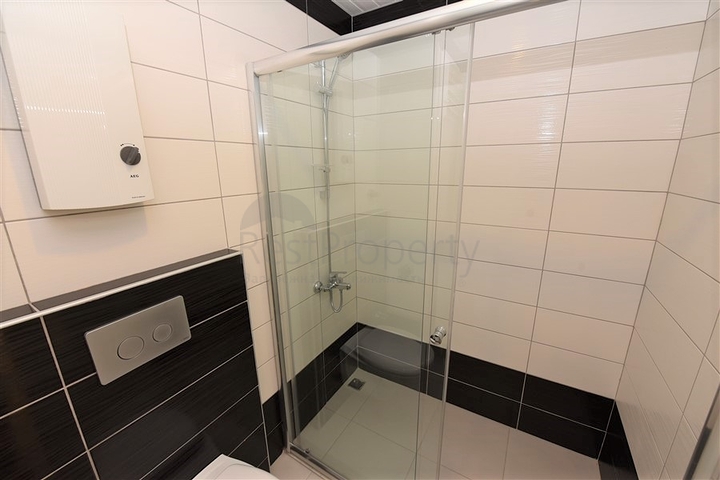 شقة غرفة وصالة ضمن مجمع خمس نوم في افسلار / الانيا 