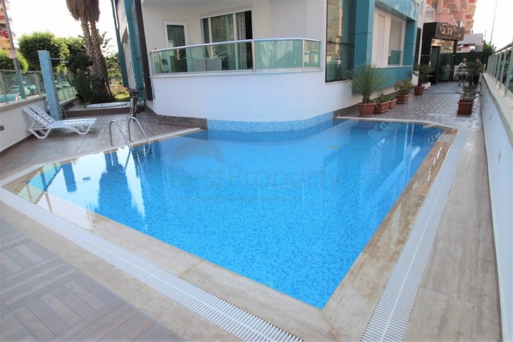 موقع مميز - شقة غرفة وصالة ضمن مجمع سكني حديث في اوبا / الانيا 