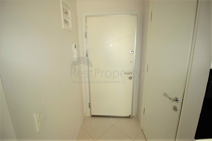 موقع مميز - شقة غرفة وصالة ضمن مجمع سكني حديث في اوبا / الانيا 