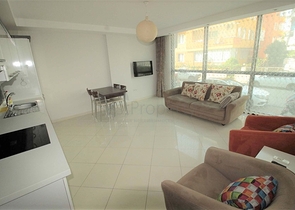 موقع مميز - شقة غرفة وصالة ضمن مجمع سكني حديث في اوبا / الانيا 