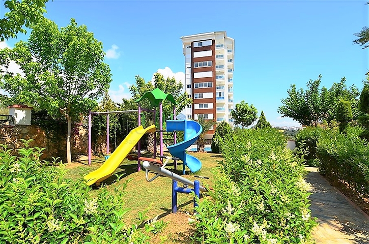 شقة غرفة وصالة مفروشة ضمن مجمع سكني في منطقة توسمور / الانيا 