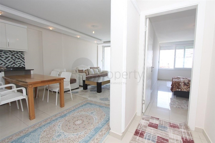 شقة غرفة وصالة مفروشة ضمن مجمع سكني في منطقة توسمور / الانيا 