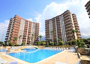 شقة عائلية - غرفتين وصالة - ضمن مجمع سكني في مهموتلار / الانيا 