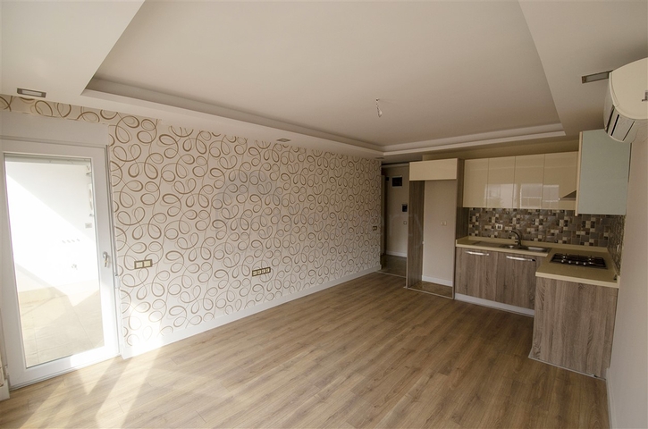 شقة 1 + 1 في منطقة ليمان كونيالتي  600 متر إلى البحر