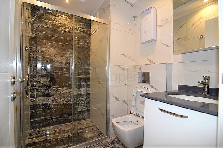 شقة غرفتين وصالة - ضمن مجمع سكني حديث - في كارجي جاك / الانيا 