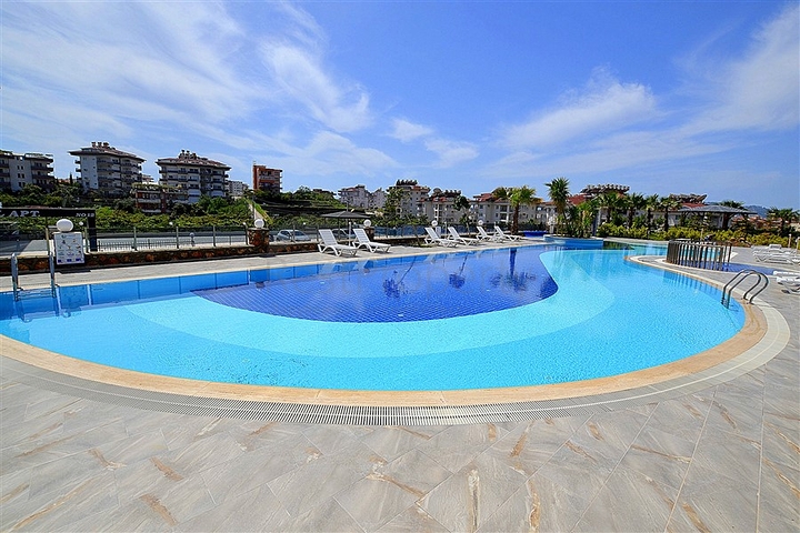 مجمع سكني فاخر - شقة غرفة وصالة - منطقة حيوية - في اوبا / الانيا 