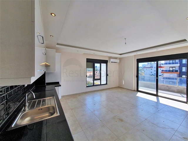 مجمع سكني فاخر - شقة غرفة وصالة - منطقة حيوية - في اوبا / الانيا 