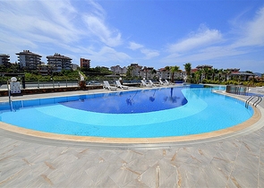 مجمع سكني فاخر - شقة غرفة وصالة - منطقة حيوية - في اوبا / الانيا 