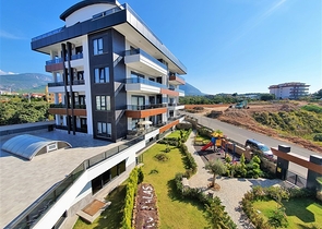 مجمع سكني فاخر - شقة غرفة وصالة - منطقة حيوية - في اوبا / الانيا 