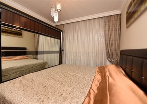 مجمع فاخر -اول صف على البحر - مركز الانيا - شقة مفروشة غرفتين وصالة 