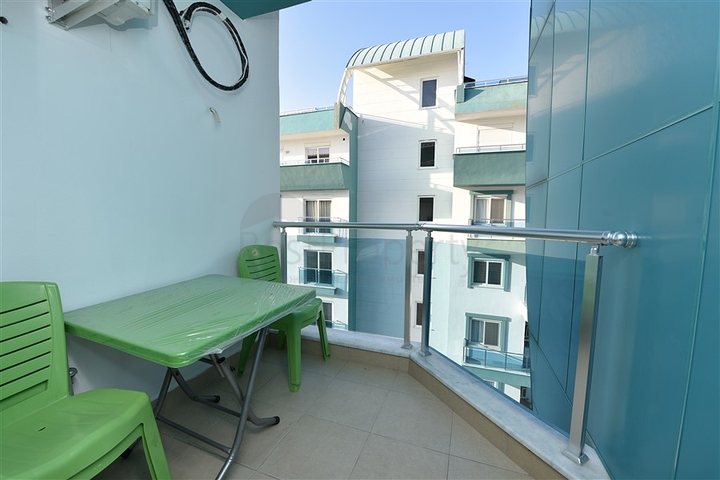 شقة مؤثثة من تصميم غرفة وصالة ضمن مجمع سكني فاخر في مهموتلار / الانيا 