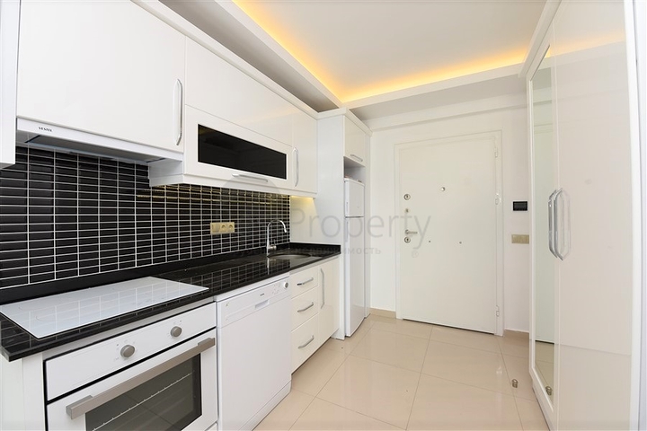 شقة مؤثثة من تصميم غرفة وصالة ضمن مجمع سكني فاخر في مهموتلار / الانيا 