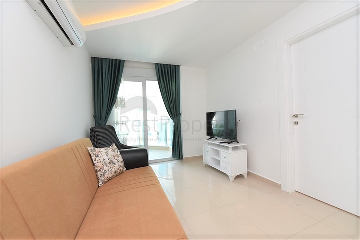 شقة مؤثثة من تصميم غرفة وصالة ضمن مجمع سكني فاخر في مهموتلار / الانيا 