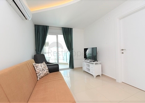 شقة مؤثثة من تصميم غرفة وصالة ضمن مجمع سكني فاخر في مهموتلار / الانيا 