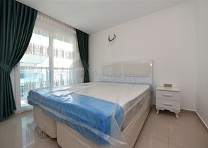 شقة مؤثثة من تصميم غرفة وصالة ضمن مجمع سكني فاخر في مهموتلار / الانيا 