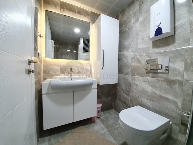 تصميم مميز - شقة مفروشة - ضمن مجمع فاخر في مهموتلار/ الانيا 