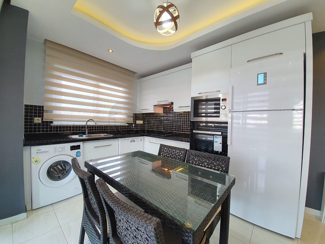 تصميم مميز - شقة مفروشة - ضمن مجمع فاخر في مهموتلار/ الانيا 