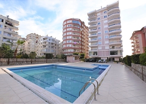 اطلالة بحرية - شقة غرفتين وصالة - ضمن مجمع اول صف على البحر - في مهموتلار / الانيا 