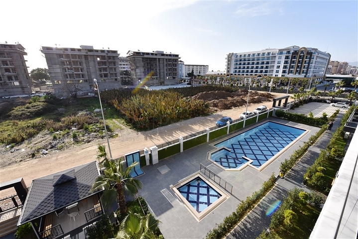 مجمع خمس نجوم - شقة فاخرة من تصميم غرفة وصالة - في الانيا 