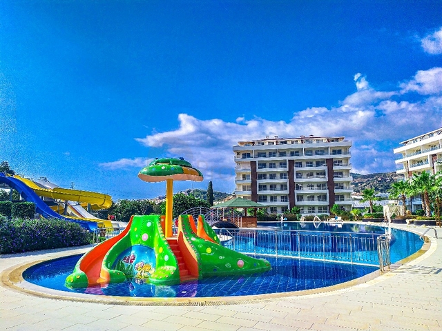 ضمن منتجع صيفي مناسب للعطلات - شقة 2 غرفة وصالة - ديمرتاش / الانيا 