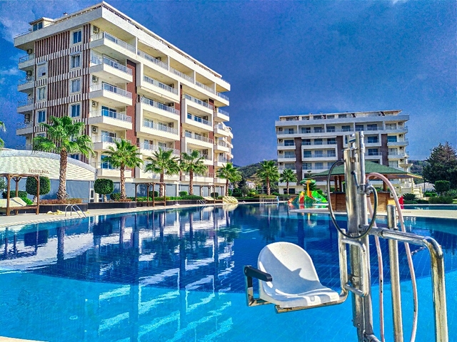 ضمن منتجع صيفي مناسب للعطلات - شقة 2 غرفة وصالة - ديمرتاش / الانيا 