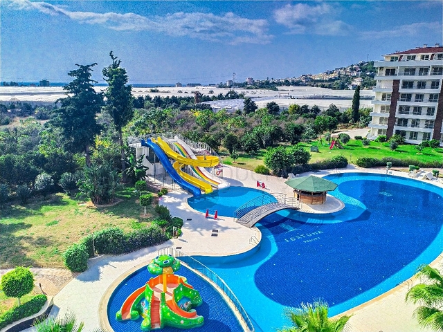 ضمن منتجع صيفي مناسب للعطلات - شقة 2 غرفة وصالة - ديمرتاش / الانيا 