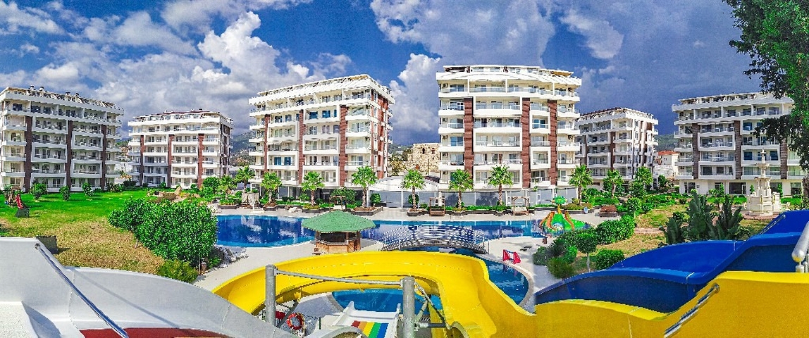 ضمن منتجع صيفي مناسب للعطلات - شقة 2 غرفة وصالة - ديمرتاش / الانيا 