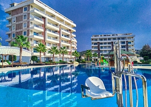 ضمن منتجع صيفي مناسب للعطلات - شقة 2 غرفة وصالة - ديمرتاش / الانيا 